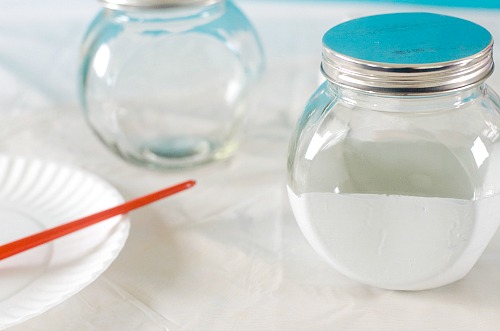 Marble Storage Jars Dollar Store DIY- Store bulk goods, candies, and more in style with these DIY marble storage jars! This easy project can be done with just dollar store supplies! | dollar store DIY, dollar store craft, dollar store organizing, painted jar, how to paint a glass jar, organization, organize