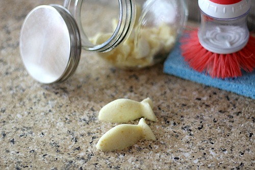 DIY Garbage Disposal Cleaner- An easy (and frugal) way to keep your disposal smelling fresh is with this DIY garbage disposal cleaner. It's an all-natural disposal refresher! | how to clean your garbage disposal, how to clean a smelly garbage disposal, stop disposal from smelling, homemade cleaner, frugal living, #DIY