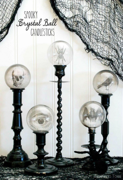 15 Frightfully Fun Halloween Decor DIYs- These DIY Halloween decorations are light on fright, heavy on fun, and easy on the budget! Check out these 15 homemade Halloween decor ideas! | Halloween wreaths, DIY Halloween candles, Mason jar craft, Halloween garland, bottle upcycle, October DIY decor