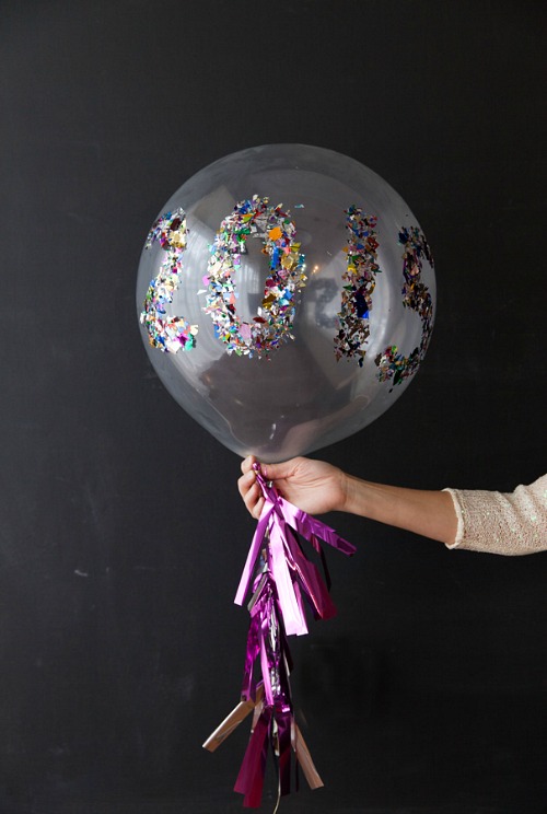 DIY New Year's Eve Balloon- You can have a fun and glamorous New Year's Eve without spending a lot! Check out these 15 DIY New Year’s Eve décor ideas for inspiration! #DIY #NewYearsEve #decor #craft #ACultivatedNest