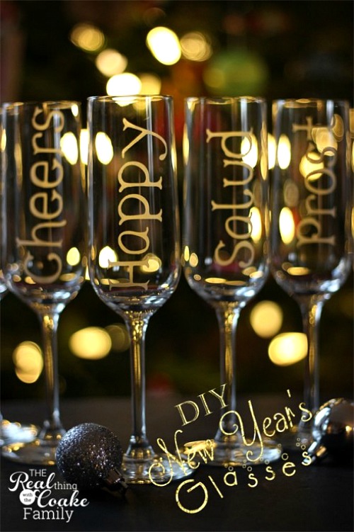 New Year's Eve Personalized Champagne Glasses- You can have a fun and glamorous New Year's Eve without spending a lot! Check out these 15 DIY New Year’s Eve décor ideas for inspiration! #DIY #NewYearsEve #decor #craft #ACultivatedNest