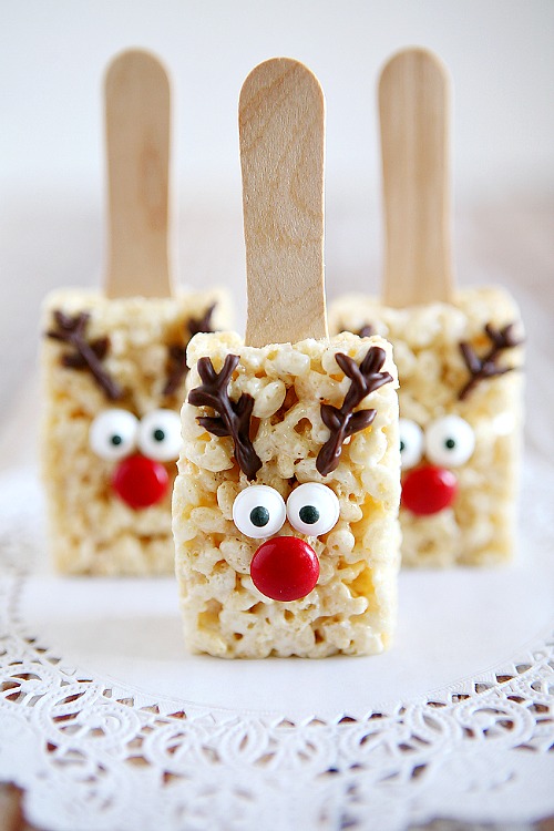 15 Christmas Homemade Rice Krispie Treats- A fun and delicious way to celebrate the holidays is with these homemade Christmas Rice Krispie Treats! | reindeer, wreath, Santa, elf, lumps of coal, #ChristmasRecipes #dessertRecipes #riceKrispies #desserts #ACultivatedNest