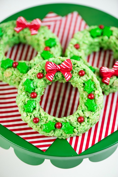 15 Homemade Christmas Rice Krispie Treats- A fun and delicious way to celebrate the holidays is with these homemade Christmas Rice Krispie Treats! | reindeer, wreath, Santa, elf, lumps of coal, #ChristmasRecipes #dessertRecipes #riceKrispies #desserts #ACultivatedNest