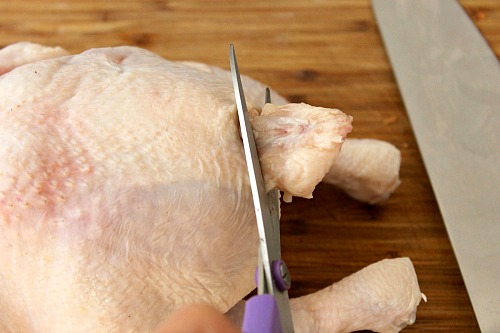 How to Quarter a Whole Chicken- You can save a lot of money on meat if you know how to quarter a whole chicken at home. And it only takes 5 minutes! Check out my easy tutorial! #frugalLiving #chicken #meat #saveMoney