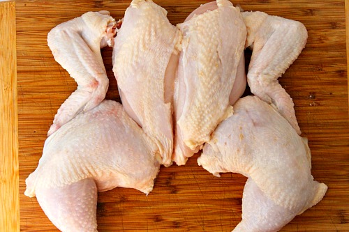 How to Quarter a Whole Chicken- You can save a lot of money on meat if you know how to quarter a whole chicken at home. And it only takes 5 minutes! Check out my easy tutorial! #frugalLiving #chicken #meat #saveMoney