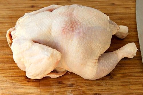 How to Quarter a Whole Chicken- You can save a lot of money on meat if you know how to quarter a whole chicken at home. And it only takes 5 minutes! Check out my easy tutorial! #frugalLiving #chicken #meat #saveMoney