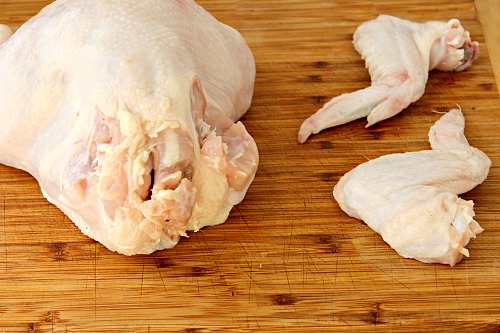 How to Quarter a Whole Chicken- You can save a lot of money on meat if you know how to quarter a whole chicken at home. And it only takes 5 minutes! Check out my easy tutorial! #frugalLiving #chicken #meat #saveMoney