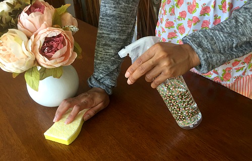 Cleaning a Table with a Homemade Cleaner