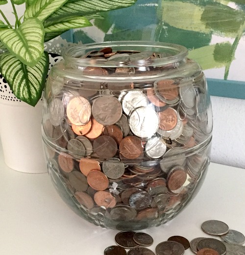 Why You Need a Coin Jar- Saving Egg Money- If you want to save money the easy way, then you need to use a coin jar! The money you save can be considered "egg money" AKA fun money! | modern day piggy bank, #moneySavingTips #saveMoney #frugalLiving #frugal #coinJar #piggyBank #ACultivatedNest