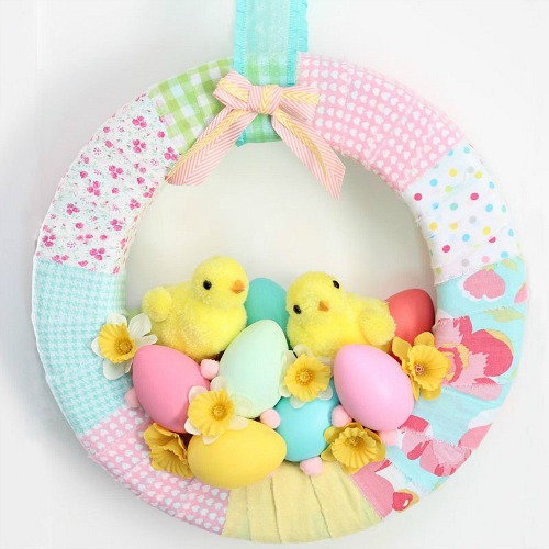 15 Gorgeous DIY Easter Wreaths- The best way to brighten up your home for Easter is with a beautiful wreath on your front door. Skip the store and make your own spring wreath for less by following these tutorials for DIY Easter wreaths! There are so many cute ones to choose from! | spring, flowers, chick, eggs, front door decor, Easter decorations, tutorials, #Easter #diy #wreath #craft