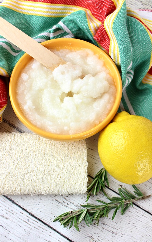 DIY Lemon and Rosemary Sugar Scrub- Tired of your skin looking dull? Make it moisturized and beautiful by using this DIY lemon and rosemary sugar scrub! It's easy to make, smells great, and even makes a great homemade gift! | #DIY #homemade #bodyScrub #beauty #diyGift #sugarScrub #faceScrub #handScrub