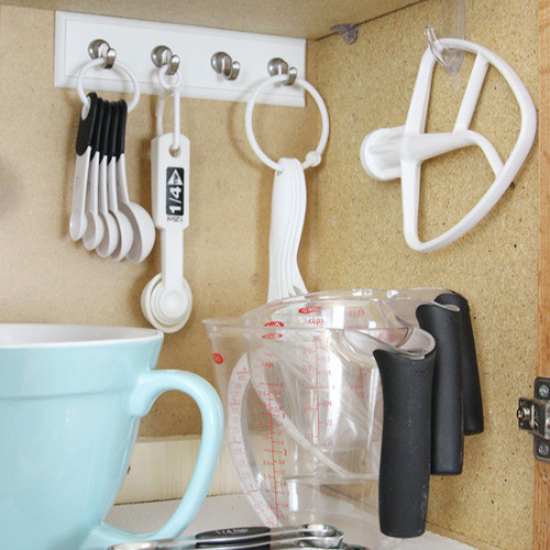 10 Frugal Ways to Organize a Small Kitchen- Organizing your small kitchen will be a lot easier when you know these 10 small kitchen organizing hacks! There are so many clever ways to create storage space in a small kitchen! | how to organize a small space, organize an apartment kitchen, organize a tiny kitchen, #kitchenOrganization #organize #homeOrganization #organizingHacks #ACultivatedNest