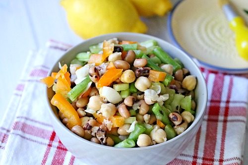 Tangy Chickpea Salad- Looking for an easy and healthy side dish? This tangy chickpea salad is both of those things, plus it's delicious! It makes a great BBQ side dish, too!