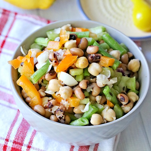 Tangy Chickpea Salad- If you're looking for the perfect side dish to complement your grilling, you have to try this easy and delicious tangy chickpea salad!