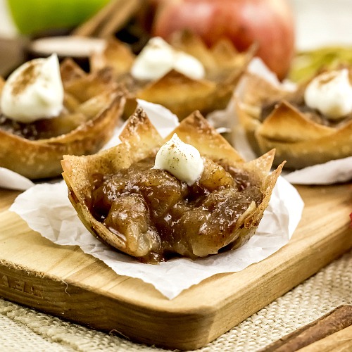Mini Apple Pie Wonton Cups- If you're looking for the perfect fall dessert, you have to make these mini apple pie wonton cups! They're easy to make, and taste so delicious! They'd also make a great party appetizer! | what to make with extra wonton wrappers, use up extra wonton wrappers, #dessert #recipe #baking #applePie #appetizer #food #fall #autumn #apples #wontonWrappers #ACultivatedNest