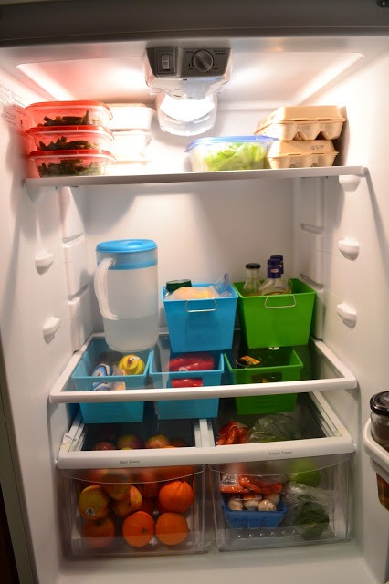 Refrigerator Organizing Ideas- Tired of your disorganized fridge? Then you'll love these clever fridge organizing ideas! They'll help get you organized, and gain fridge space! | #organization #homeOrganization #kitchenOrganizing #fridgeOrganization #ACultivatedNest