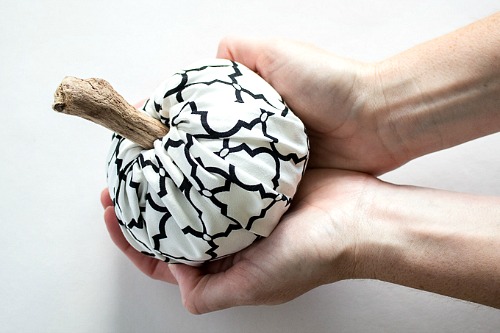 DIY Handmade Fabric Pumpkins (No Sewing Required!)- These no-sew DIY fabric pumpkins are an easy and frugal way to add new fall decor to your home. Plus, they're really easy to customize! | #DIY #craft #decor #pumpkins #fall #fallDecor #autumn #noSew #decorating #fallDecorating #ACultivatedNest