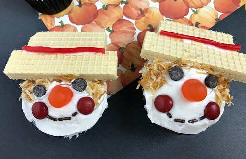 Scarecrow Cupcakes Fall Dessert- For a fun and easy fall dessert, you have to make these cute scarecrow cupcakes! They'd be a lot of fun to decorate with kids! | recipe, autumn food, #dessert #cupcakes #ACultivatedNest
