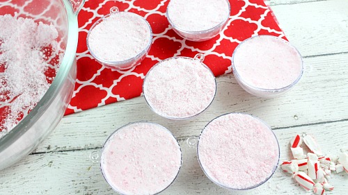 Make Your Own Candy Cane Bath Bombs- For a fun and festive way to relax this holiday season, make these DIY candy cane bath bombs! They make a great homemade gift! | beauty, bath fizzy tutorial, #bathBomb #DIYGift #ACultivatedNest