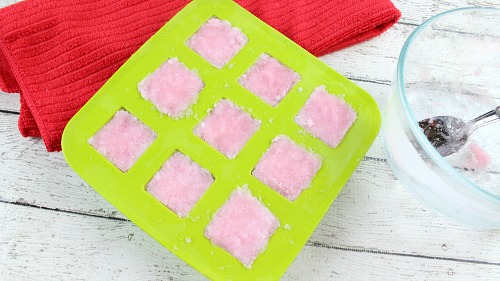 DIY Peppermint Body Scrub Cubes- These DIY candy cane sugar scrub cubes smell like peppermint! They're wonderful DIY Christmas gifts, or a great way to keep your skin healthy in the winter! | body scrub, face scrub, hand scrub, homemade gift ideas, #diyGift #sugarScrub #ACultivatedNest