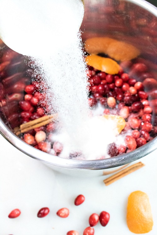 Instant Pot Homemade Cranberry Sauce Recipe - Make your holiday dinner the most delicious one ever with this quick, easy, and inexpensive Instant Pot homemade cranberry sauce! | make your own cranberry sauce, Thanksgiving, Christmas, holiday food, #recipe #homemade #ACultivatedNest