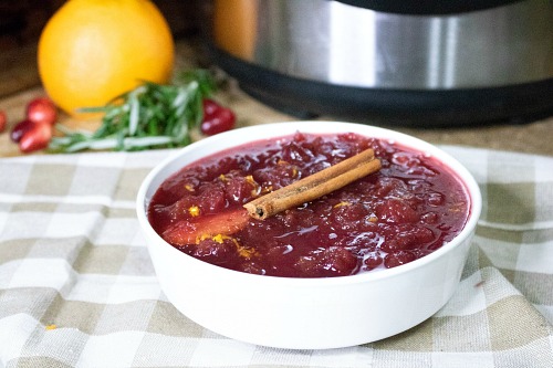 Instant Pot Homemade Cranberry Sauce- Make your holiday dinner the most delicious one ever with this quick, easy, and inexpensive Instant Pot homemade cranberry sauce! | make your own cranberry sauce, Thanksgiving, Christmas, holiday food, #recipe #homemade #ACultivatedNest