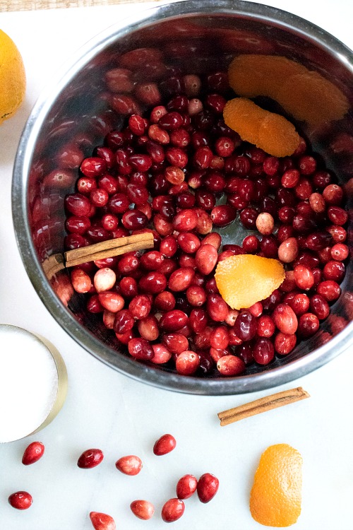 Homemade Cranberry Sauce Made in the Instant Pot- Make your holiday dinner the most delicious one ever with this quick, easy, and inexpensive Instant Pot homemade cranberry sauce! | make your own cranberry sauce, Thanksgiving, Christmas, holiday food, #recipe #homemade #ACultivatedNest