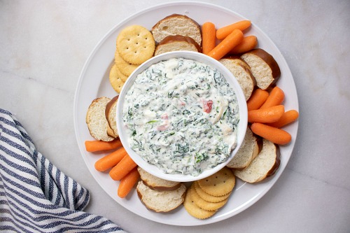 Slow Cooker Spinach Dip from Scratch- If you want to make spinach dip the easy way, make it in your slow cooker! This slow cooker spinach dip only takes minutes to set up, and is so delicious! | Crock-Pot spinach dip, easy game day recipes, how to make homemade spinach dip, easy food ideas, spinach dip from scratch, #appetizer #slowCooker #ACultivatedNest