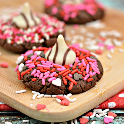 Chocolate Hershey Hug Valentine Cookies- These chocolate Hershey hug Valentine cookies are the perfect dessert recipe for Valentine's Day! They're delicious, and easy to make! | Valentine's cookies, Valentine's treats, baking, easy recipes, love themed cookies, romance cookies, hearts, #ValentinesDay #cookies #ACultivatedNest