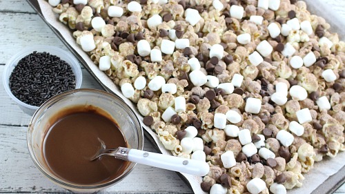 Hot Cocoa Dessert Popcorn- This hot chocolate popcorn snack is perfect for winter! It's so delicious, and a very easy dessert popcorn to make for every day, or for family movie night! | easy chocolate snack recipe idea, #chocolate #popcorn #ACultivatedNest