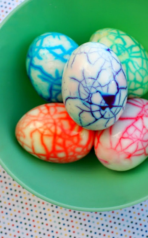 Rainbow Dinosaur Eggs- Keep your kids entertained this Easter with these 17 fun and frugal Easter kids activities! They're so fun, and very inexpensive! | spring kids crafts, paper plate crafts, bunny kids crafts, DIY easter eggs, #Easter #kidsActivities #ACultivatedNest