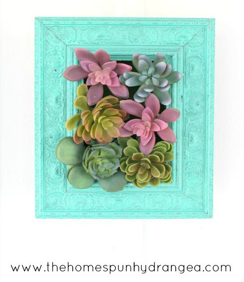 Vertical Succulent Garden- An inexpensive and easy way to make pretty decor is with dollar store materials! Check out all of this pretty home decor made with dollar store frames! | dollar store decor DIY projects, dollar store crafts, upcycle old frames, #dollarStore #dollarTree #DIY #decor #AcultivatedNest