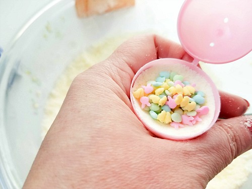 Sprinkle Surprise Homemade Easter Egg Bath Bombs- If you want a fun non-candy DIY gift to put in Easter baskets this year, then you need to make these sprinkle surprise Easter egg bath bombs! | homemade gift, DIY bath bomb, homemade bath bomb, Easter bath bomb, Easter basket stuffer, #Easter #bathBombs #ACultivatedNest