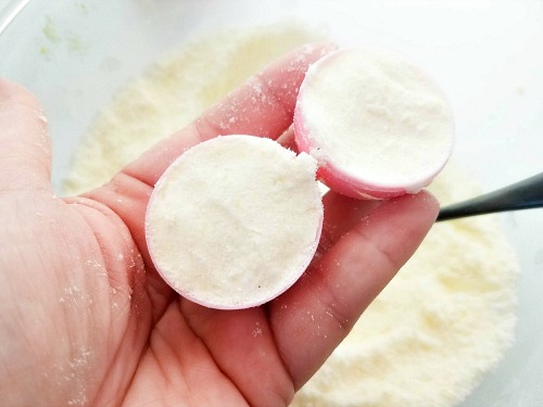 Easter Egg Bath Bombs DIY Easter Basket Stuffers- If you want a fun non-candy DIY gift to put in Easter baskets this year, then you need to make these sprinkle surprise Easter egg bath bombs! | homemade gift, DIY bath bomb, homemade bath bomb, Easter bath bomb, Easter basket stuffer, #Easter #bathBombs #ACultivatedNest