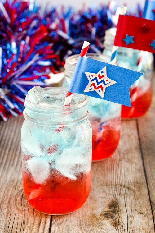 Homemade Patriotic Drink Recipe- For a fun (and tasty) drink to serve at your next Memorial Day or Fourth of July party, make this red, white, and blue layered drink + DIY straw flags! | patriotic drink recipe, homemade drink, #drinkRecipe #FourthOfJuly #MemorialDay #ACultivatedNest