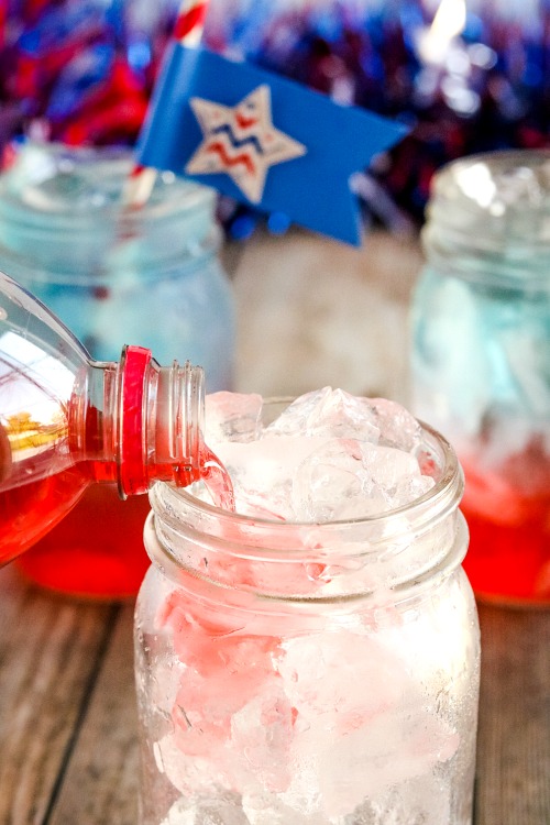 Red, White, and Blue Layered Drink Recipe- For a fun (and tasty) drink to serve at your next Memorial Day or Fourth of July party, make this red, white, and blue layered drink + DIY straw flags! | patriotic drink recipe, homemade drink, #drinkRecipe #FourthOfJuly #MemorialDay #ACultivatedNest