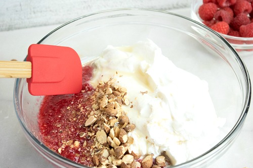 Raspberry Almond No-Churn Ice Cream Recipe- You don't need an ice cream maker to make a delicious frozen treat this summer! Instead, make this easy raspberry almond no-churn ice cream! | homemade ice cream, make ice cream without ice cream machine, #iceCream #recipe #dessert #noChurnIceCream #ACultivatedNest