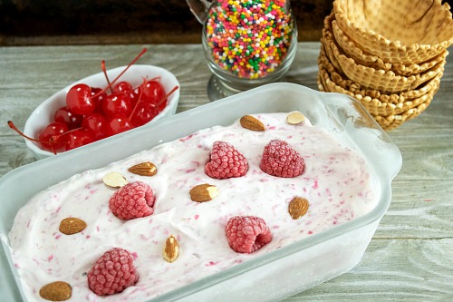How to Make Raspberry Ice Cream without an Ice Cream Machine- You don't need an ice cream maker to make a delicious frozen treat this summer! Instead, make this easy raspberry almond no-churn ice cream! | homemade ice cream, make ice cream without ice cream machine, #iceCream #recipe #dessert #noChurnIceCream #ACultivatedNest