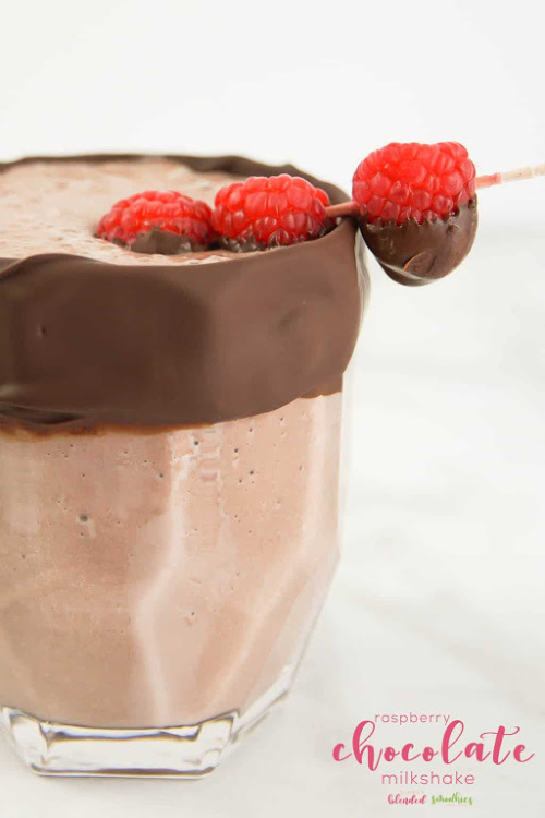 Raspberry Chocolate Milkshake- This is the ultimate list of easy and delicious Christmas drink recipes. Serve them at your next holiday party and everyone will rave about them for sure! | holiday drink recipes, nonalcoholic drinks, kid friendly drinks, hot drinks, cold drinks, #recipe #drinks #ChristmasDrinks #alcoholicDrinks #ACultivatedNest