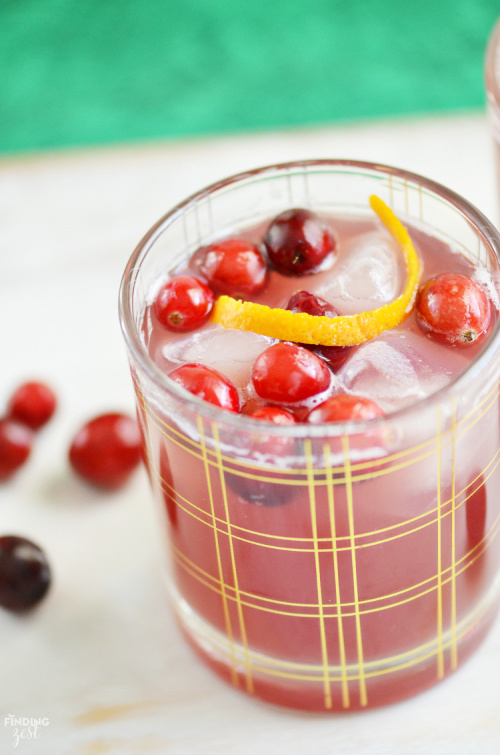 Cranberry Pineapple Mocktail Recipe- This is the ultimate list of easy and delicious Christmas drink recipes. Serve them at your next holiday party and everyone will rave about them for sure! | holiday drink recipes, nonalcoholic drinks, kid friendly drinks, hot drinks, cold drinks, #recipe #drinks #ChristmasDrinks #alcoholicDrinks #ACultivatedNest