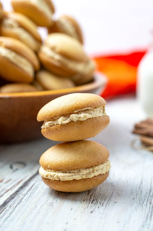 Easy Pumpkin Cheesecake Sandwich Cookies- These mini pumpkin cheesecake sandwich cookies are just the perfect snacking size! One isn't going to be enough and with one taste, you'll see why! | fall dessert recipes, autumn treat recipes, #recipe #pumpkin #dessert #cookies #ACultivatedNest