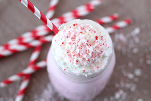 Candy Cane Milkshake Recipe- This is the ultimate list of easy and delicious Christmas drink recipes. Serve them at your next holiday party and everyone will rave about them for sure! | holiday drink recipes, nonalcoholic drinks, kid friendly drinks, hot drinks, cold drinks, #recipe #drinks #ChristmasDrinks #alcoholicDrinks #ACultivatedNest