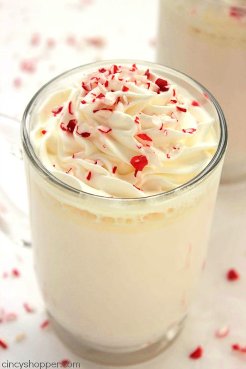 Peppermint Hot Chocolate Drink Recipe- This is the ultimate list of easy and delicious Christmas drink recipes. Serve them at your next holiday party and everyone will rave about them for sure! | holiday drink recipes, nonalcoholic drinks, kid friendly drinks, hot drinks, cold drinks, #recipe #drinks #ChristmasDrinks #alcoholicDrinks #ACultivatedNest