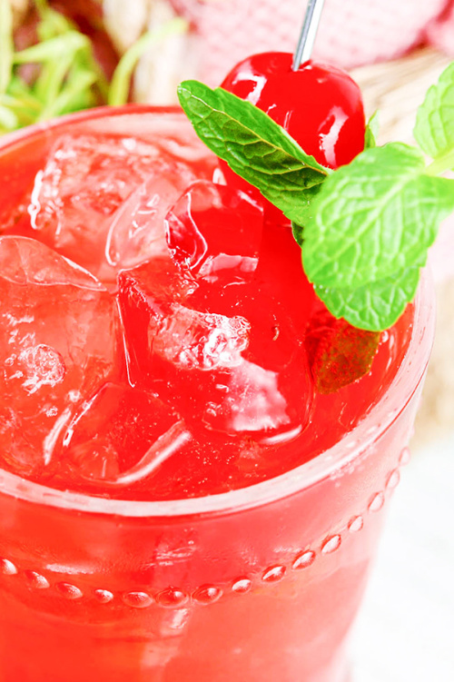 Cherry Shirley Temple Recipe- This is the ultimate list of easy and delicious Christmas drink recipes. Serve them at your next holiday party and everyone will rave about them for sure! | holiday drink recipes, nonalcoholic drinks, kid friendly drinks, hot drinks, cold drinks, #recipe #drinks #ChristmasDrinks #alcoholicDrinks #ACultivatedNest