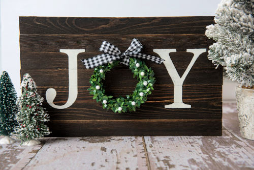 Joy Sign DIY Holiday Decor- This DIY joy sign is beautiful and looks great with all your holiday decorations. Plus, it's very easy and inexpensive to make! | rustic Christmas decor, #DIY #craft #Christmas #holidayDecor #ACultivatedNest