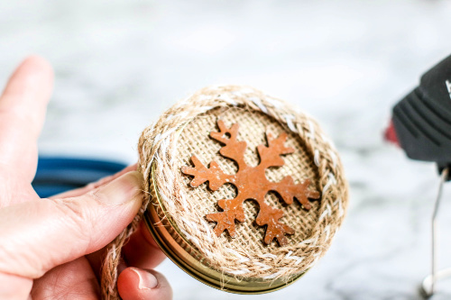 Burlap Homemade Christmas Tree Ornament DIY- This beautiful burlap Mason jar lid ornament is easy to make and would look lovely on your Christmas tree! It also makes a great DIY ornament gift! | homemade ornament, rustic Christmas ornament DIY, #ChristmasCraft #ChristmasOrnament #craft #DIY #ACultivatedNest