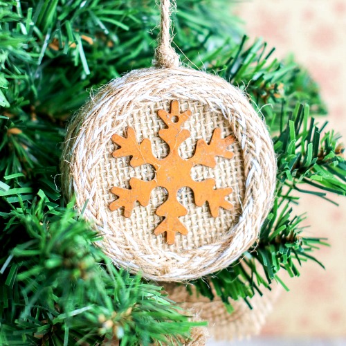 Burlap Mason Jar Lid Ornament Craft- This beautiful burlap Mason jar lid ornament is easy to make and would look lovely on your Christmas tree! It also makes a great DIY ornament gift! | homemade ornament, rustic Christmas ornament DIY, #ChristmasCraft #ChristmasOrnament #craft #DIY #ACultivatedNest
