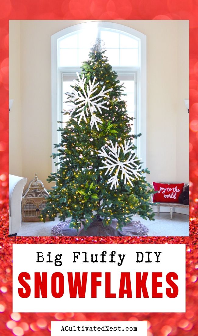 Fluffy Big DIY Snowflakes- If you want a big statement piece to add to your home's Christmas decor, you need to make these beautiful fluffy big DIY snowflakes! They're easy to make and will add a touch of elegance to your space! | Christmas craft, frugal Christmas decorations, #diyProject #ChristmasDIY #craft #Christmas #ACultivatedNest