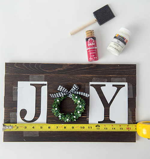 DIY Joy Rustic Sign- This DIY joy sign is beautiful and looks great with all your holiday decorations. Plus, it's very easy and inexpensive to make! | rustic Christmas decor, #DIY #craft #Christmas #holidayDecor #ACultivatedNest