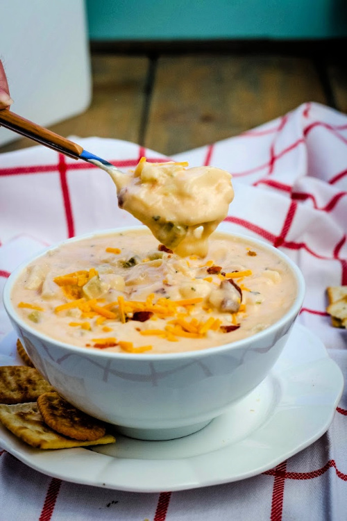 Easy Potato Chowder from Scratch- This cheesy potato chowder recipe is so delicious, and easy to make! It's the perfect comfort food for a cold winter day! | winter recipe, potato recipe, #chowder #recipe #comfortFood #soup #ACultivatedNest